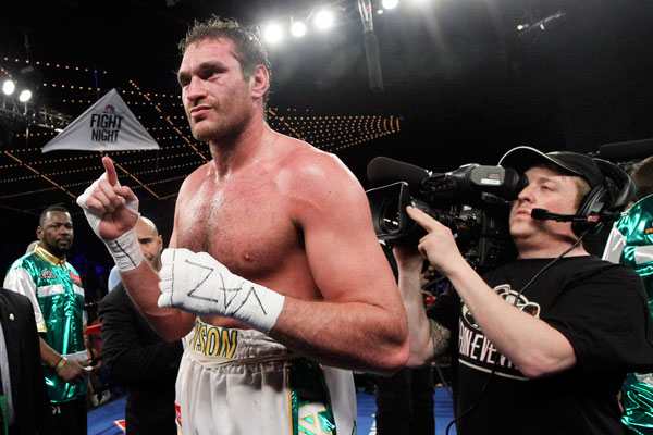 Tyson Fury poses after his seventh round KO vs. Steve Cunningham on April 20 at Madison Square Garden. (AP)